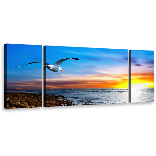 Bird Sunset Wall Art, Dramatic Clouds in Orange Sky Canvas Print, Blue Sky Bird Soaring Triptych Canvas Set