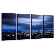 Load image into Gallery viewer, Cloudy Cityscape Canvas Print, Dramatic Blue Sky Skyline Wall Art, Yellow City Lights 4 Piece Multiple Canvas
