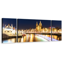 Load image into Gallery viewer, Harbors Canals Canvas Wall Art, Yellow City Lights Reflection Canals Multi Canvas, Blue Sky Amsterdam Central Damrak 3 Piece Canvas Print
