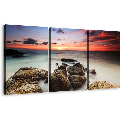 Ocean Boulders Canvas Wall Art, Yellow Red Cloudy Sky Ocean Canvas Set, Brown Ocean Rocks Beach 3 Piece Canvas Print