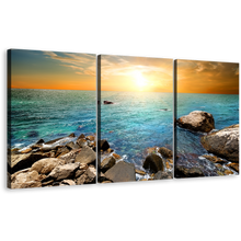 Load image into Gallery viewer, Ocean Rocks Canvas Print, Blue Sea Stony Beach 3 Piece Canvas Wall Art, Yellow Sky Sunrise Multiple Canvas
