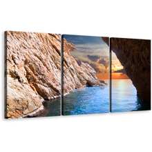 Load image into Gallery viewer, Ocean Rocks Canvas Print, Yellow Cloudy Sunset Sky Multiple Canvas, Blue Ocean Inside Brown Cave Ocean 3 Piece Wall Art
