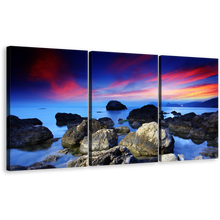 Load image into Gallery viewer, Ocean Rocks Canvas Wall Art, Dramatic Red Sky Seascape Canvas Print, Blue Sea Stony Beach Ocean 3 Piece Multiple Canvas
