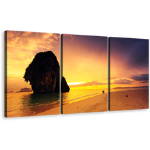 Load image into Gallery viewer, Sand Beach Wall Art, Yellow Cloudy Sunset Sky Canvas Print, Brown Sand Ocean Rocks 3 Piece Multi Canvas
