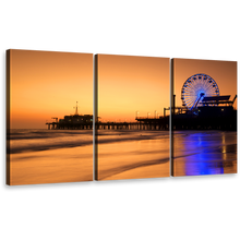 Load image into Gallery viewer, Santa Monica Canvas Wall Art, Blue Neon lit Ferris Wheel 3 Piece Canvas, Beautiful Ocean Beach Canvas Set, Orange Beach Pier Sunset Sky Canvas Print
