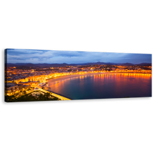 Load image into Gallery viewer, Spain Beach Canvas Print, La Concha Bay at Dusk San Sebastian&#39;s Yellow City Lights Panoramic Canvas, Blue Sky City Beach Wall Art
