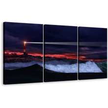 Load image into Gallery viewer, Stormwatch Beacon Wall Art, Orange Lighthouse Beam Triptych Canvas Print, Beacon Night Blue Waves Canvas Set
