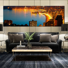 Load image into Gallery viewer, benidorm  beach  canvas  print  yellow  coastline  night  city  beach  panorama  amazing  blue  night  city  beach  wall  art In Living Room
