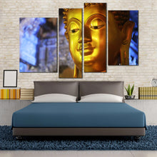 Load image into Gallery viewer, buddha statue canvas print blue background 4 piece multiple canvas gold buddha mind and soul wall art for your Bedroom
