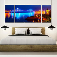 Load image into Gallery viewer, city  beach  canvas  print  blue  bay  cross  sea  bridge  scene  night  lights  water  reflection  3  piece  wall  art  for  bedroom
