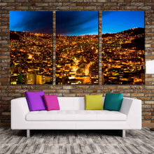 Load image into Gallery viewer, cityscape majesty wall art beautiful cityscape skyline canvas set gold city lights bolivia 3 piece canvas print In Living room
