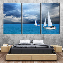 Load image into Gallery viewer, coastal breeze wall art white sailing boats seascape 3 piece set dramatic cloudy blue ocean canvas print In Bedroom
