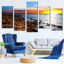 Load image into Gallery viewer, coastal horizon tranquil stony beach under cloudy sky multi canvas orange sunset sea 5 piece wall art In Living Room
