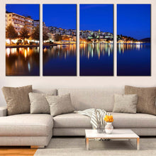 Load image into Gallery viewer, coastal tranquility 4 piece canvas print of boats seascape with yellow greece houses light reflection wall art for Your Living room
