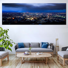 Load image into Gallery viewer, dramatic  skyline  wall  art  blue  cloudy  sky  canvas  artwork  yellow  city  lights  canvas  print In Living Room
