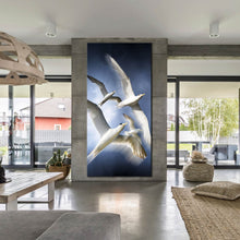 Load image into Gallery viewer, graceful  dove  canvas  print  flock  of  white  birds  vertical  canvas  artwork  birds  soaring  in  blue  sky  canvas  wall  art In Living Room
