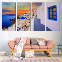 Load image into Gallery viewer, greece sunset magic canvas 4 piece canvas set of oia village orange sunset sky and blue aegean sea wall art In Living Room
