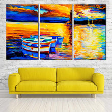 Load image into Gallery viewer, lighthouse reflection canvas print yellow orange ocean 3 piece wall art blue boat ship multi canvas In Living Room
