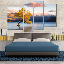 Load image into Gallery viewer, mountain lake canvas print yellow alone tree at dawn multi canvas blue wanaka new zealand 4 piece wall art in bedroom
