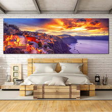 Load image into Gallery viewer, oia  s  purple  dawn  panoramic  canvas  of  greece  houses  by  the  aegean  sea  with  dramatic  yellow  clouds  wall  art  for  bedroom
