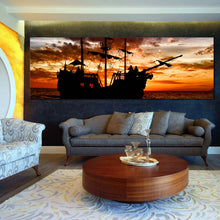 Load image into Gallery viewer, orange  sunset  pirate  ship  canvas  print  dramatic  black  boat  ship  panoramic  canvas  wall  art In Living Room
