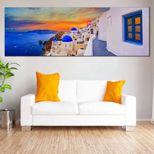 Load image into Gallery viewer, santorini  dreams  wall  art  panoramic  canvas  print  of  dramatic  orange  clouds  overlooking  the  aegean  sea  canvas  artwork In Living Room
