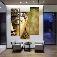 Load image into Gallery viewer, serene  buddha  wall  art  meditation  buddha  close  up  canvas  print  graceful  gold  buddha  statue  3  piece  canvas In Living Room
