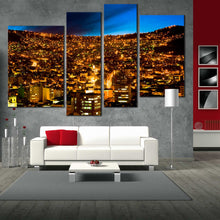 Load image into Gallery viewer, skyline elevation canvas print blue sky city mountains wall art gold city lights bolivia 4 piece multi canvas In Living Room
