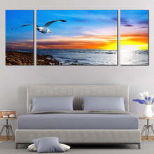 Load image into Gallery viewer, sunset  breeze  bird  canvas  wall  art  clouds  in  orange  sky  canvas  set  bird  soaring  in  blue  sky  triptych  canvas  print  for  bedroom
