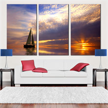 Load image into Gallery viewer, sunset sailboat escape canvas print sailboat at sunset triptych blue gold ocean 3 piece wall art In Living room
