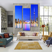 Load image into Gallery viewer, toronto  dreams  wall  art  blue  lake  ontario  triptych  canvas  print  canada  yellow  city  lights  3  piece  canvas  set In Living Room
