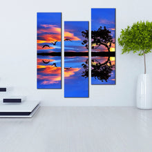 Load image into Gallery viewer, twilight  sky  birds  canvas  print  sunset  lake  reflection  3  piece  canvas  orange  sky  over  blue  lake  wall  art In Living Room
