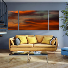 Load image into Gallery viewer, vibrant  sunset  abstract  canvas  print  3  piece  orange  sky      red  clouds  wall  art In Living Room
