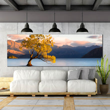 Load image into Gallery viewer, wanaka  new  zealand  wall  art  blue  mountains  lake  panoramic  canvas  artwork  yellow  alone  tree  at  dawn  canvas  print In Living Room
