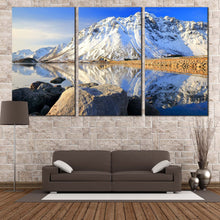 Load image into Gallery viewer, Arctic Majesty Wall Art, Blue Norway Sky Landscape 3 Piece Canvas Set, White Lofoten Islands Mountain River Canvas Print In Living room
