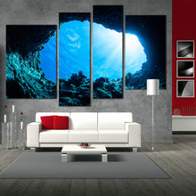 Load image into Gallery viewer, 4 piece sun light streaming through ocean beach wall decor 
