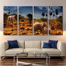 Load image into Gallery viewer, African elephants in Mountains Desert Palm TreesMulti Panel Wall Art In Living room
