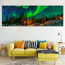 Load image into Gallery viewer, Aurora  Borealis  Canvas  Wall  Art  Green  Aurora  House  Trees  Wide  Canvas  Yellowknife  Canada  Blue  Starry  Sky  Living  Room  Panoramic  Canvas  Print For Living Room
