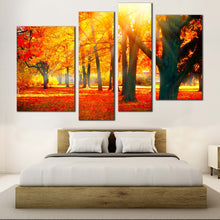 Load image into Gallery viewer, Autumnal Park Canvas Wall Art Yellow Sunbeam Trees Forest Canvas Print Red Autumn Fall Nature Scenery 4 Piece Multiple Canvas In Bedroom
