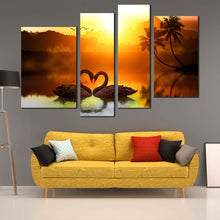 Load image into Gallery viewer, Bird Canvas Print Two Swans Make Up A Heart Reflected On Water 4 piece canvas print 
