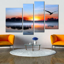 Load image into Gallery viewer, Birds Flying Blue Sky at Dawn 4 Piece Canvas Print In Living Room
