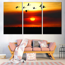 Load image into Gallery viewer, Birds Sunset Canvas Wall Art Orange Sunset Birds Flock Canvas Print Yellow Sky Flying Birds Silhouette  3 Piece Canvas In Living Room
