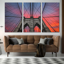 Load image into Gallery viewer, Brooklyn NYC Bridge Dramatic Sunset 3 pc. canvas artwork In Living room
