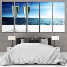 Load image into Gallery viewer, Champagne Sea Canvas Print Champagne White Cloudy Sky  5 Piece Canvas Wall Art Drink Glasses Blue Ocean View Multi Panel Canvas In Bedroom
