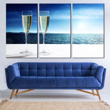 Load image into Gallery viewer, Champagne Sea Canvas Print Champagne White Cloudy Sky  3 Piece Canvas Wall Art Drink Glasses Blue Ocean View Multi Panel Canvas In Living room
