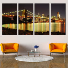 Load image into Gallery viewer, City Bridge Canvas Print Brooklyn Bridge Illuminated At Night  4 Piece Canvas Wall Art Yellow New York Skyline Canvas Set Grey NYC Sky Multi Canvas In Living room
