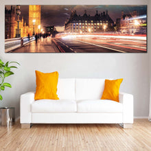 Load image into Gallery viewer, Clock  Tower  Canvas  Wall  Art  England  Gold  Big  Ben  1  Piece  Canvas  London  City  Red  Light  Trail  Canvas  Print  Westminster  Green  Cloudy  Sky  Wide  Canvas In  Living Room
