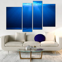 Load image into Gallery viewer, Deep blue ocean sunbeam abstract multipanel canvas wall art 
