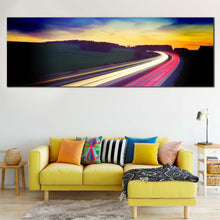 Load image into Gallery viewer, Dramatic  Clouds  Canvas  Wall  Art  Blue  Sky  Car  Lights  Trail  Living  Room  Living  Room  1  Piece  Canvas  Print  Red  Yellow  Light  Trail  Wide  Canvas In Living Room

