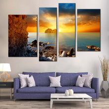 Load image into Gallery viewer, Dramatic Sunset Canvas Wall Art Blue Sea Ocean Rocks Boulders Multi Canvas Yellow Sky Stony Beach  4 Piece Canvas Print For Living Room
